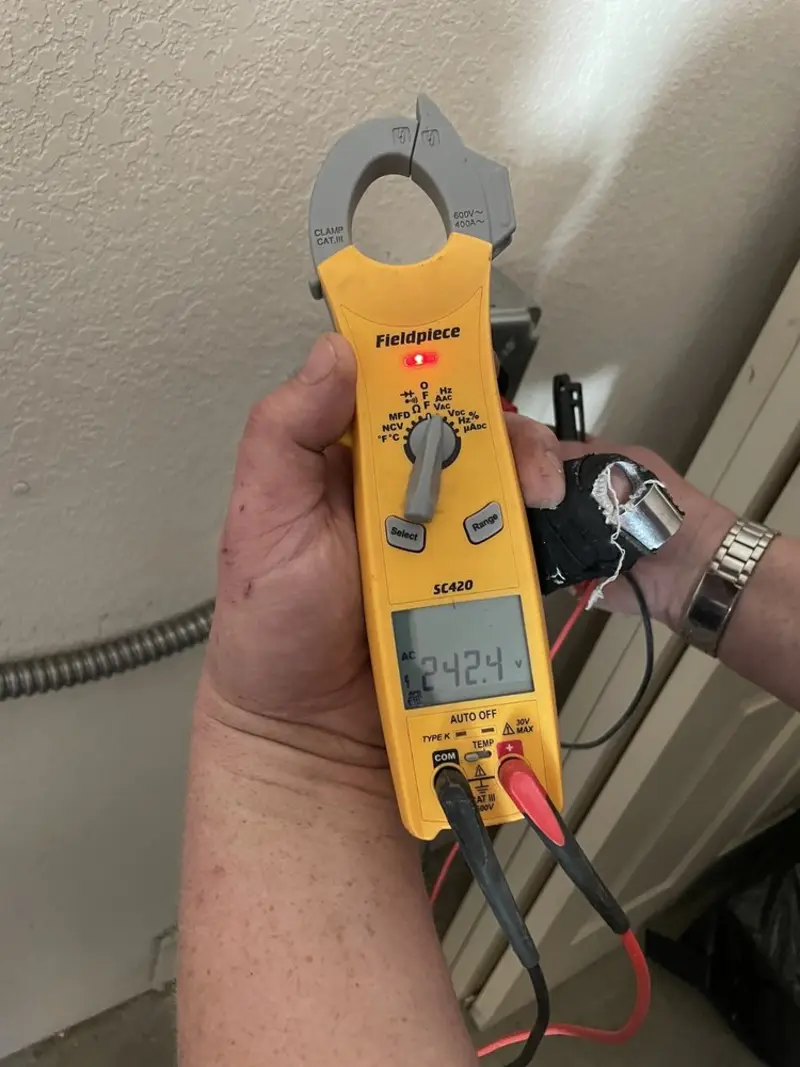 Voltage testing with clamp meter during Recessed Lighting Installation in Fort Knox